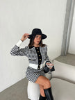 Ensemble gilet et jupe à carreaux noir et blanc