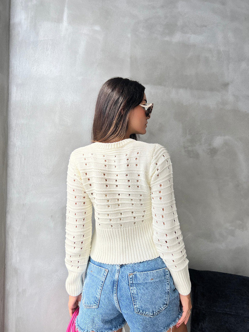 Cardigan en maille ajourée blanche